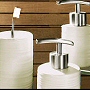 round porcelain bath accessories with a matte finish and ribbed design available in putty and nut brown