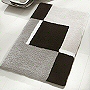 contemporary medium pile bath mat with geometric black white and grey design