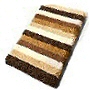 plush striped multi color bath rug in beige, blue, black or purple