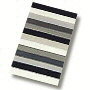 plush striped multi color bath rug in beige, blue, black or purple