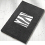 animal print bathroom rug in nut brown, slate grey, black and white or taupe